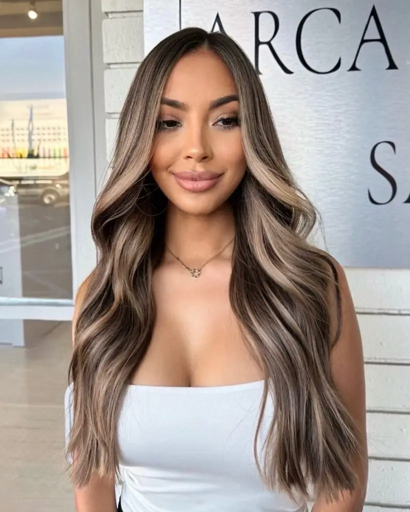 Sleek bob with bold caramel highlights