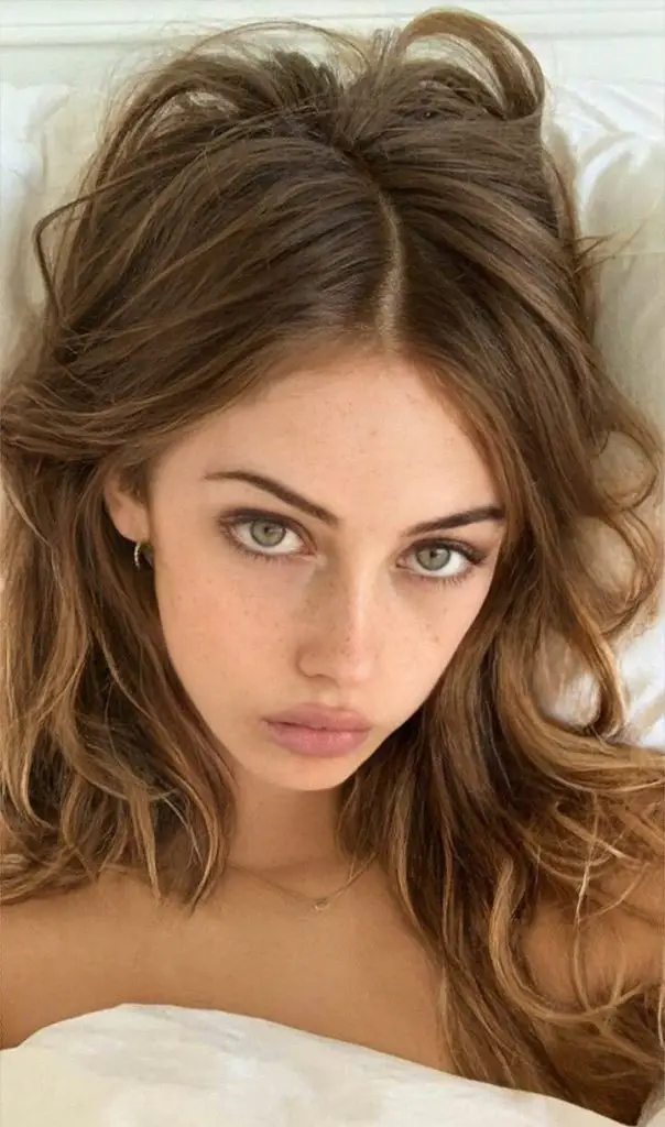Glossy Brunette Locks with Feathered Ends