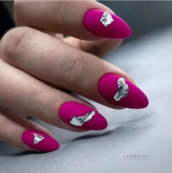 Matte red Valentine’s Day nails with gold foil accents