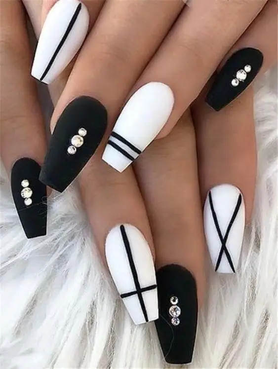 Short Nude Acrylic Nails with White and Green Leaf Patterns