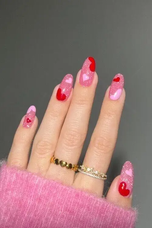 Glossy Red Nails with Gold Foil Accents