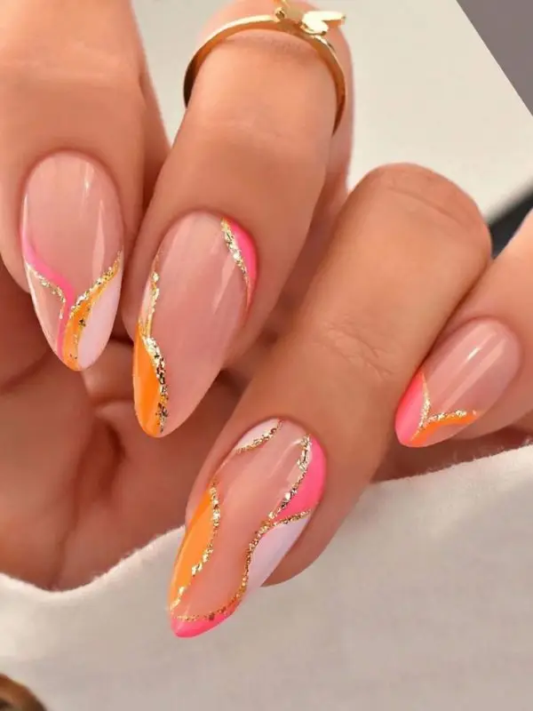 Bold Metallic Nails with Graphic Details
