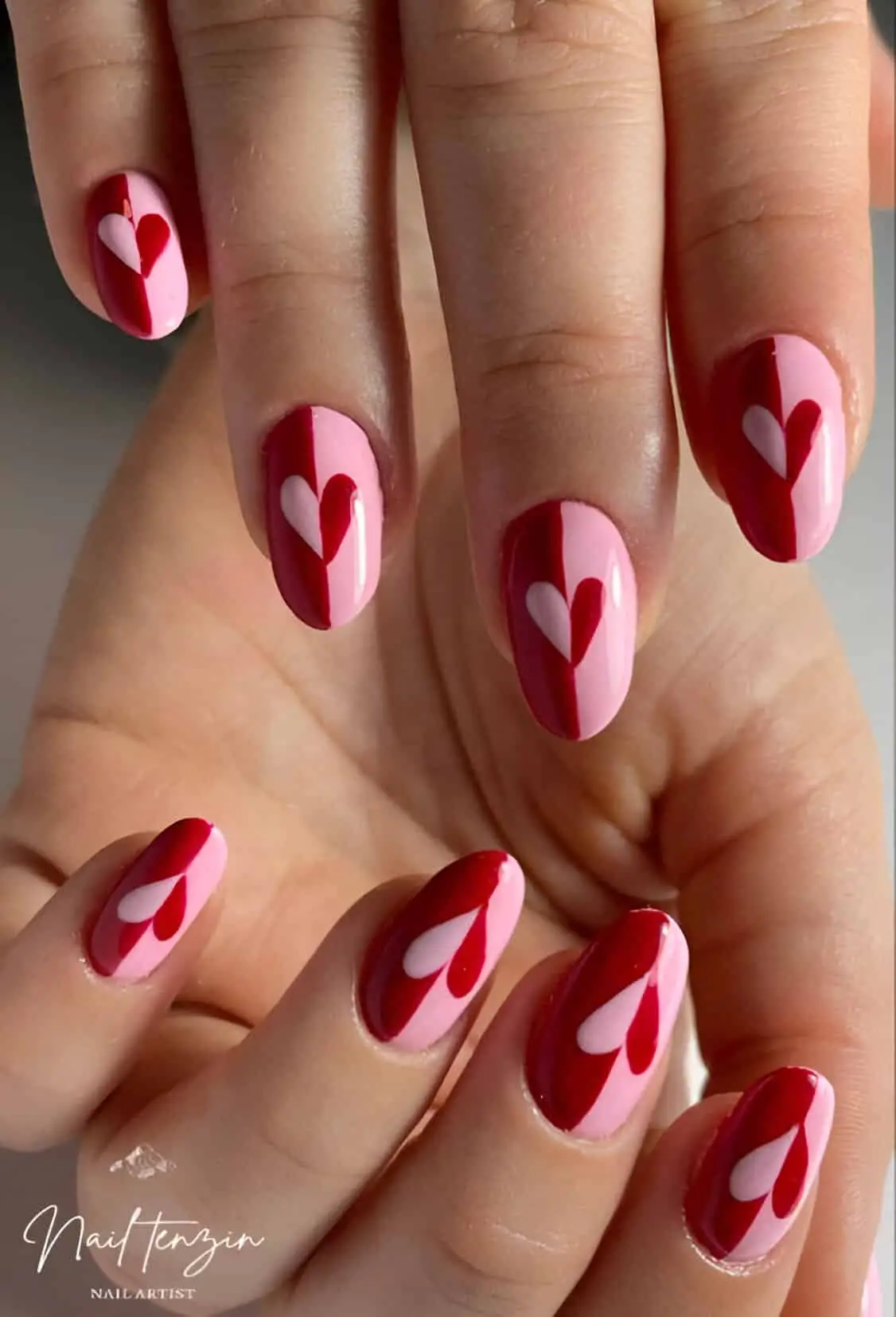 Red and gold Valentine’s Day nails with fine metallic accents