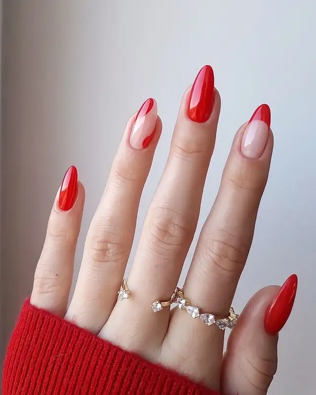 Bright red nails with a glassy, high-shine finish