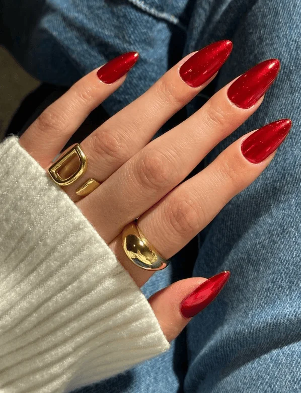 Glitter red nails with sparkling heart details and rhinestones