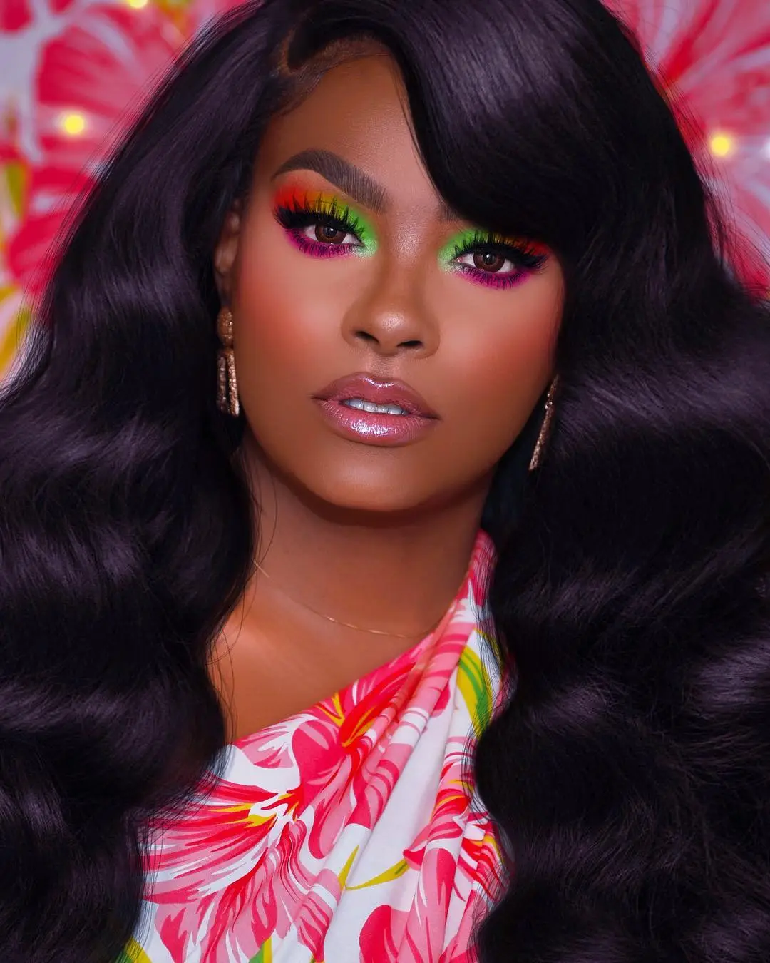 Brown eyes enhanced by warm, sunset-inspired tones