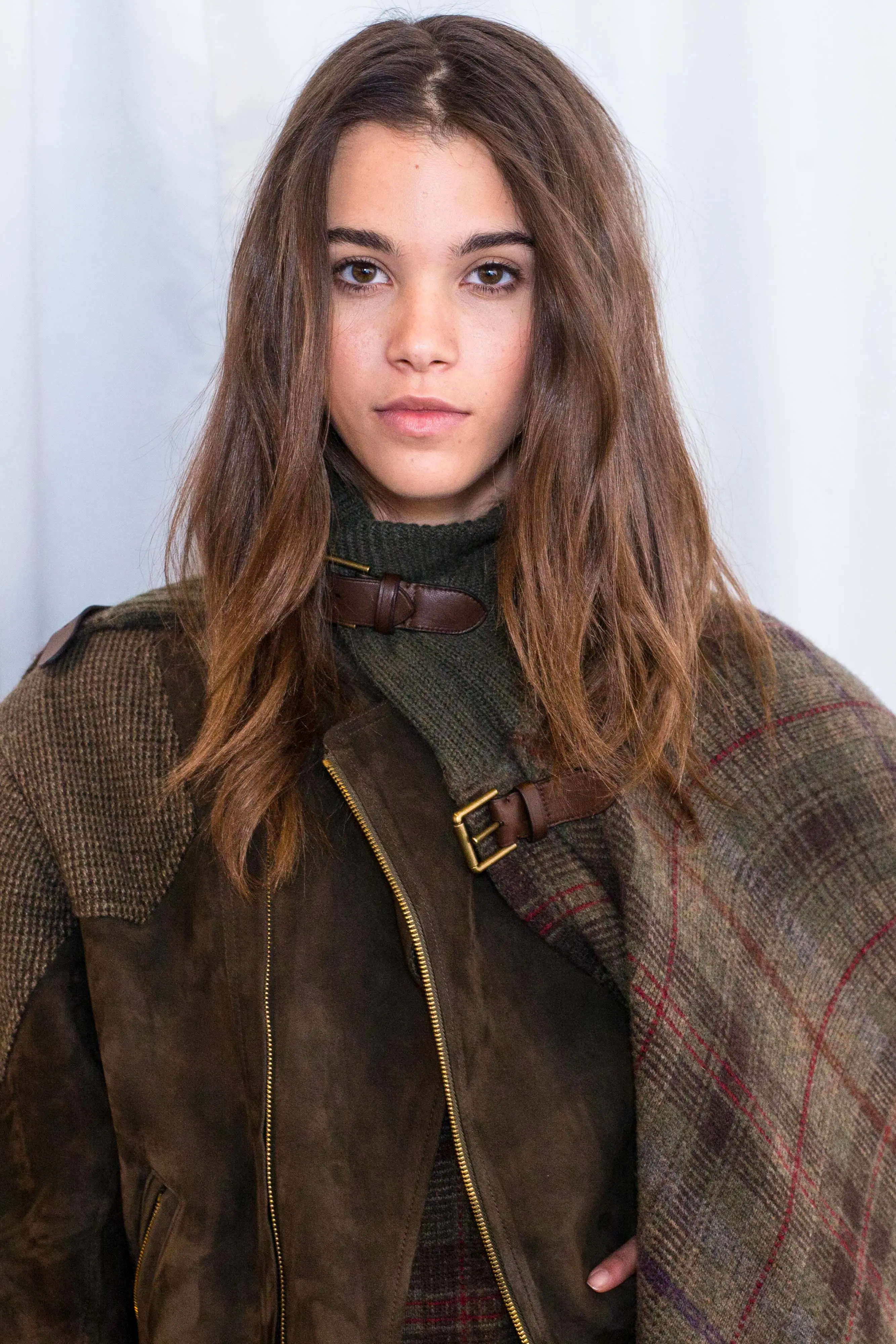 Subtle sombre with dusty caramel highlights in brown hair
