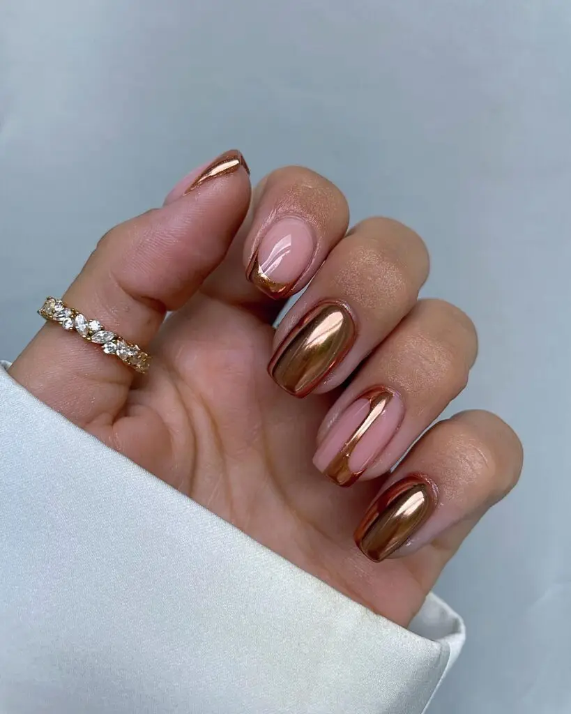Neutral nails with copper metallic swirl accents