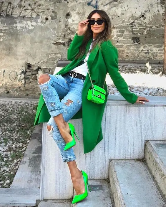 Cropped green cardigan paired with a white maxi skirt for a chic Saint Patrick's Day outfit