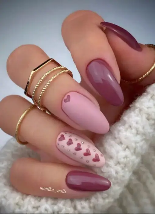 Pale pink nails with 3D heart details for Valentine’s Day
