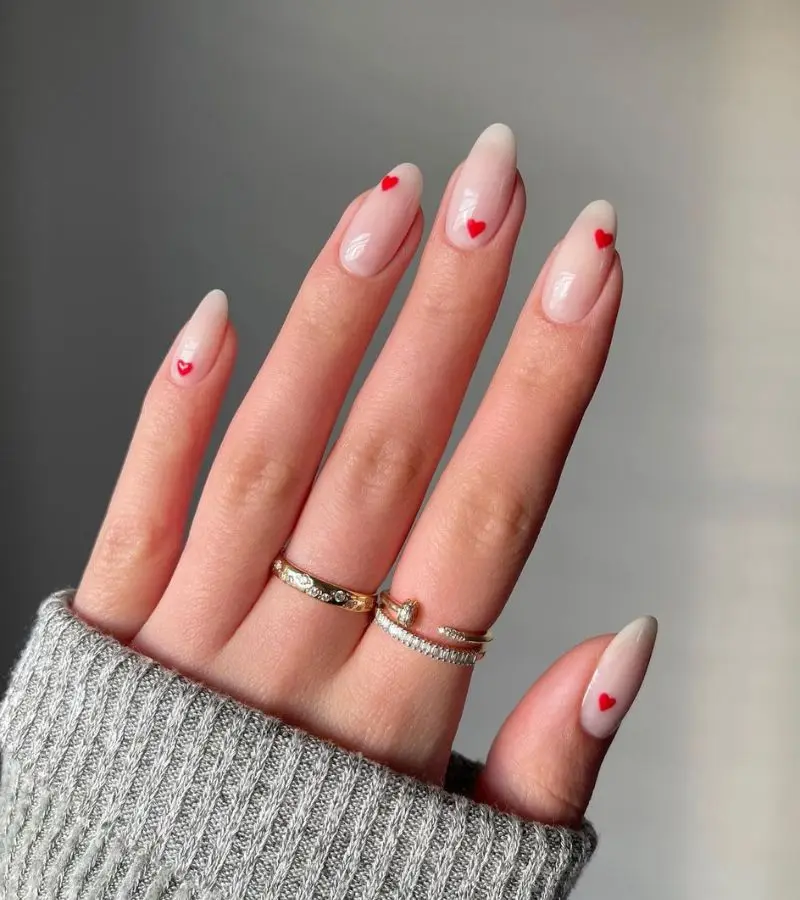Glossy Soft Pink Nails with Tiny White Hearts