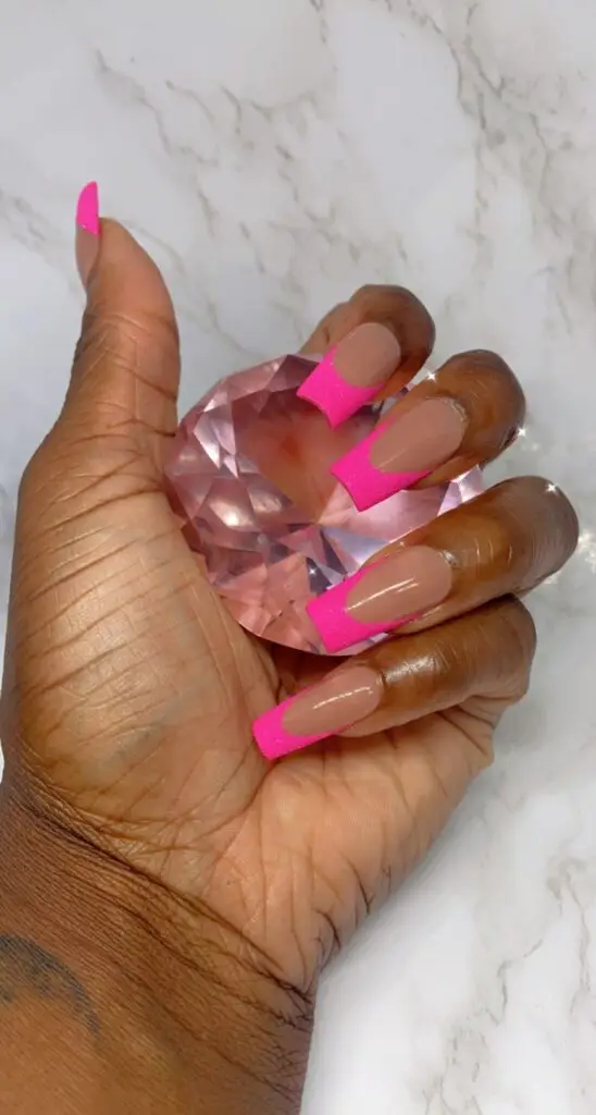 Red ombre Valentine's Day nails with white heart accents