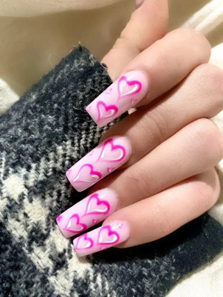 Matte Valentine Nails with White Floral Accents