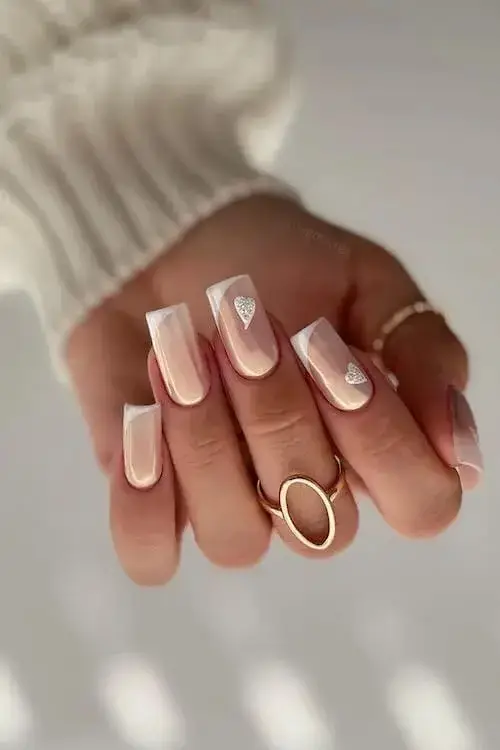 Soft Gray Nails with Subtle Pink Hearts