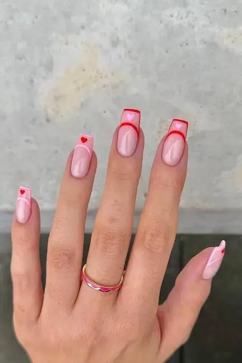 Plum Nails with White Heart and Glitter Accents