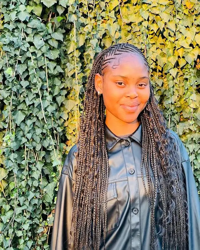 Goddess cornrows adorned with vibrant, multicolored beads