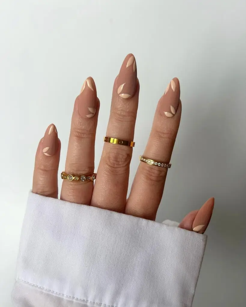 Nude nails with soft floral accents