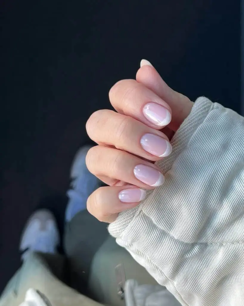 Classic old money manicure with pastel polish and subtle accents