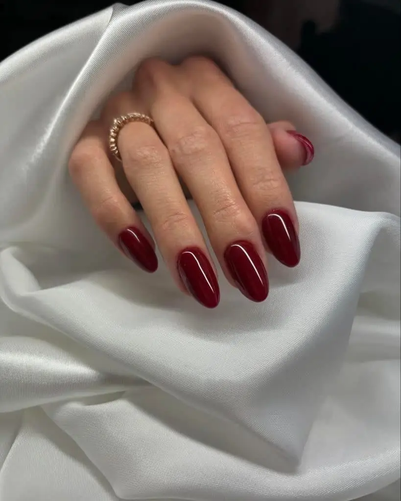 Modern French manicure with elegant gold accents