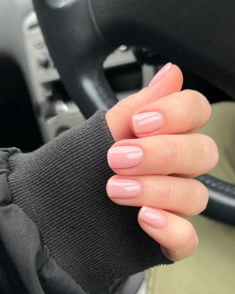 Neutral nails with gold French tips