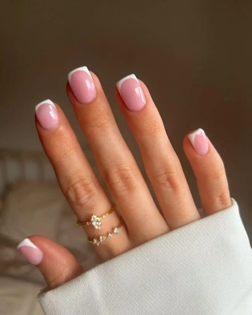 Neutral nails with rose gold French tips and gradient base