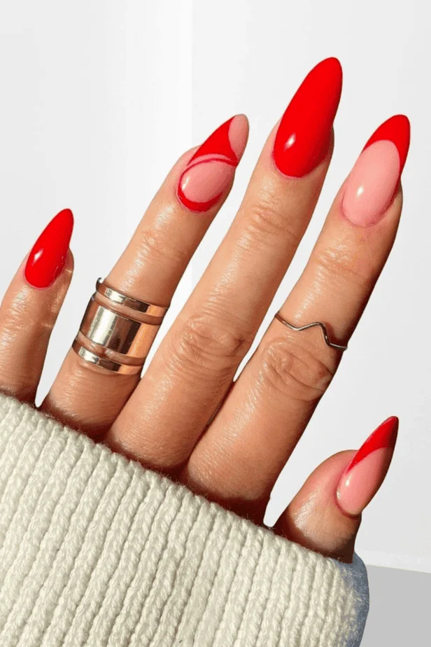Elegant red and white French-tip Valentine’s nails with a glossy finish