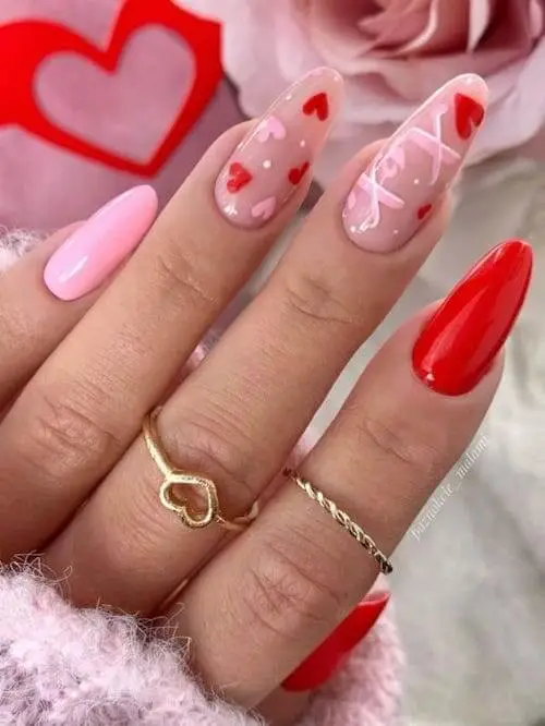Metallic Red Valentine’s Nails with Black Accents