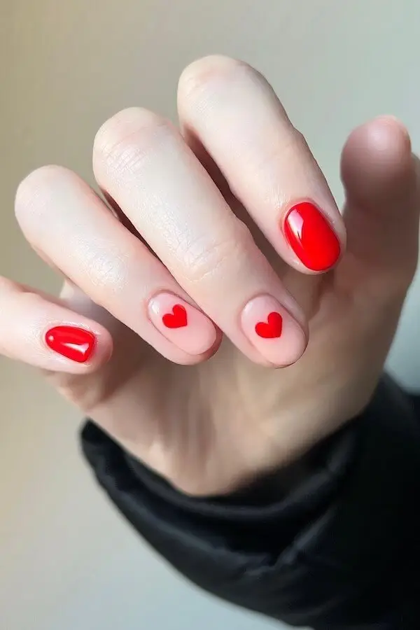 Neon Coral Valentine’s Gel Nails with Heart Decals