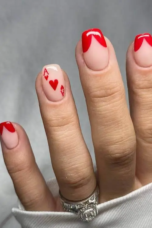 Pink Valentine’s Day nails with glitter on the tips