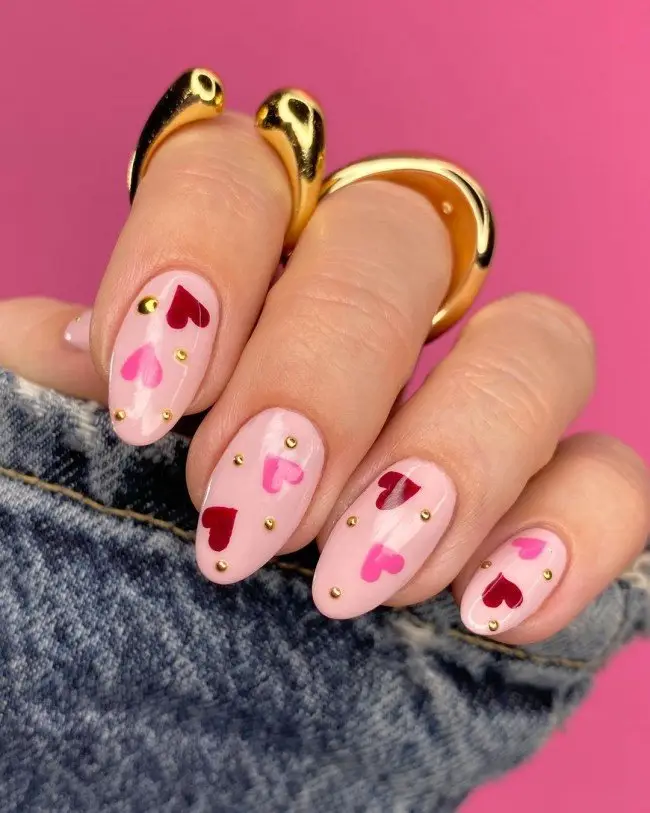 Vivid Red Nails with Gold Glitter Accents