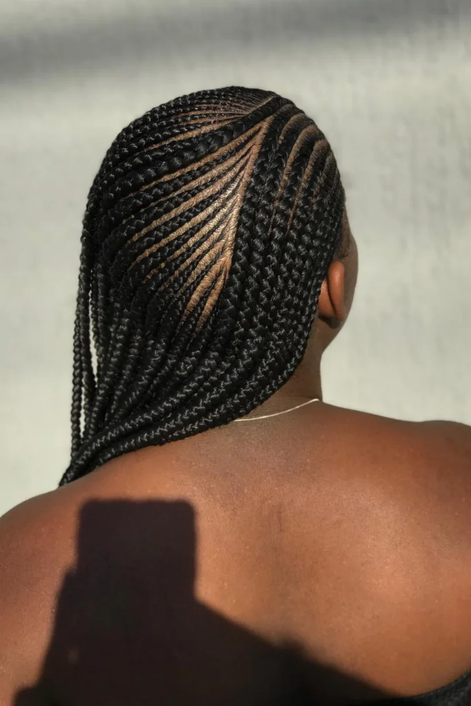 Alicia Keys rocking an asymmetrical braided bob with golden beads