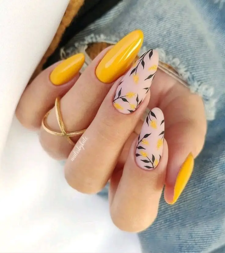 Short coral acrylic nails with botanical designs
