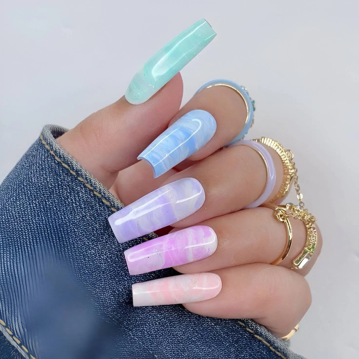 Peachy Swirl Nails with Glitter Highlights