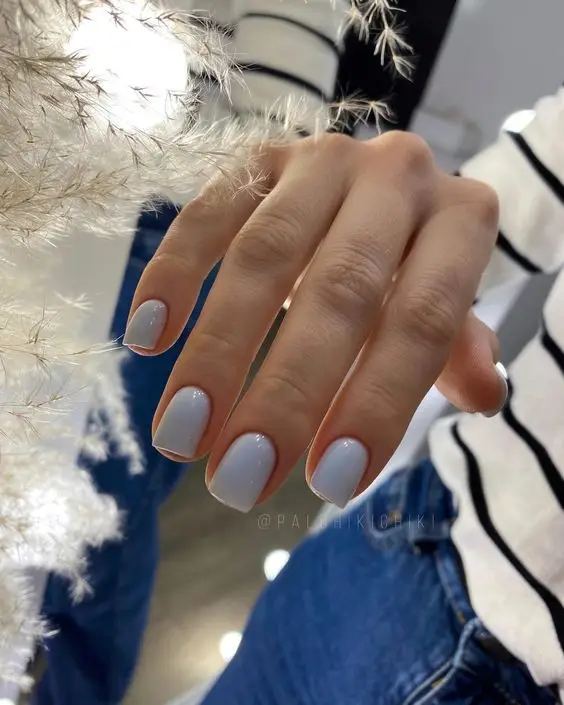 Short Nails in Soft Beige with Tiny White Florals