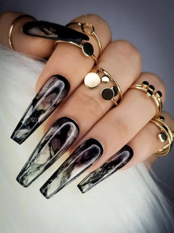 Edgy Black and Gold Nails