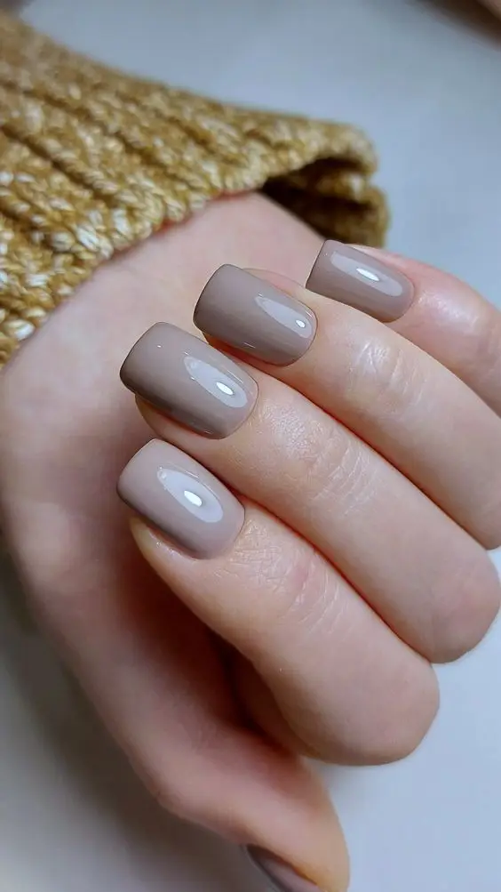 Short Nails in Neutral Beige with Abstract Line Art