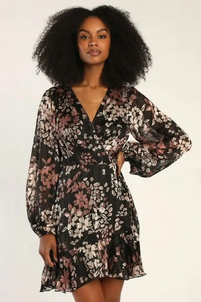 Black woman in a floral maxi skirt and crop top