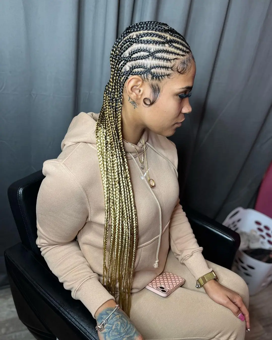 Chunky goddess stitch cornrows leading into voluminous curls