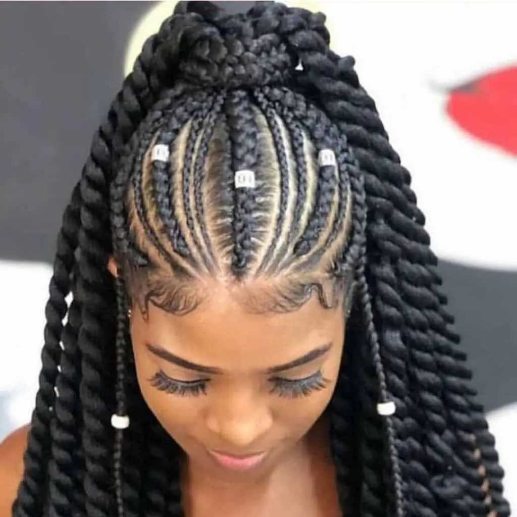 Freestyle zigzag parting transitioning into goddess cornrows