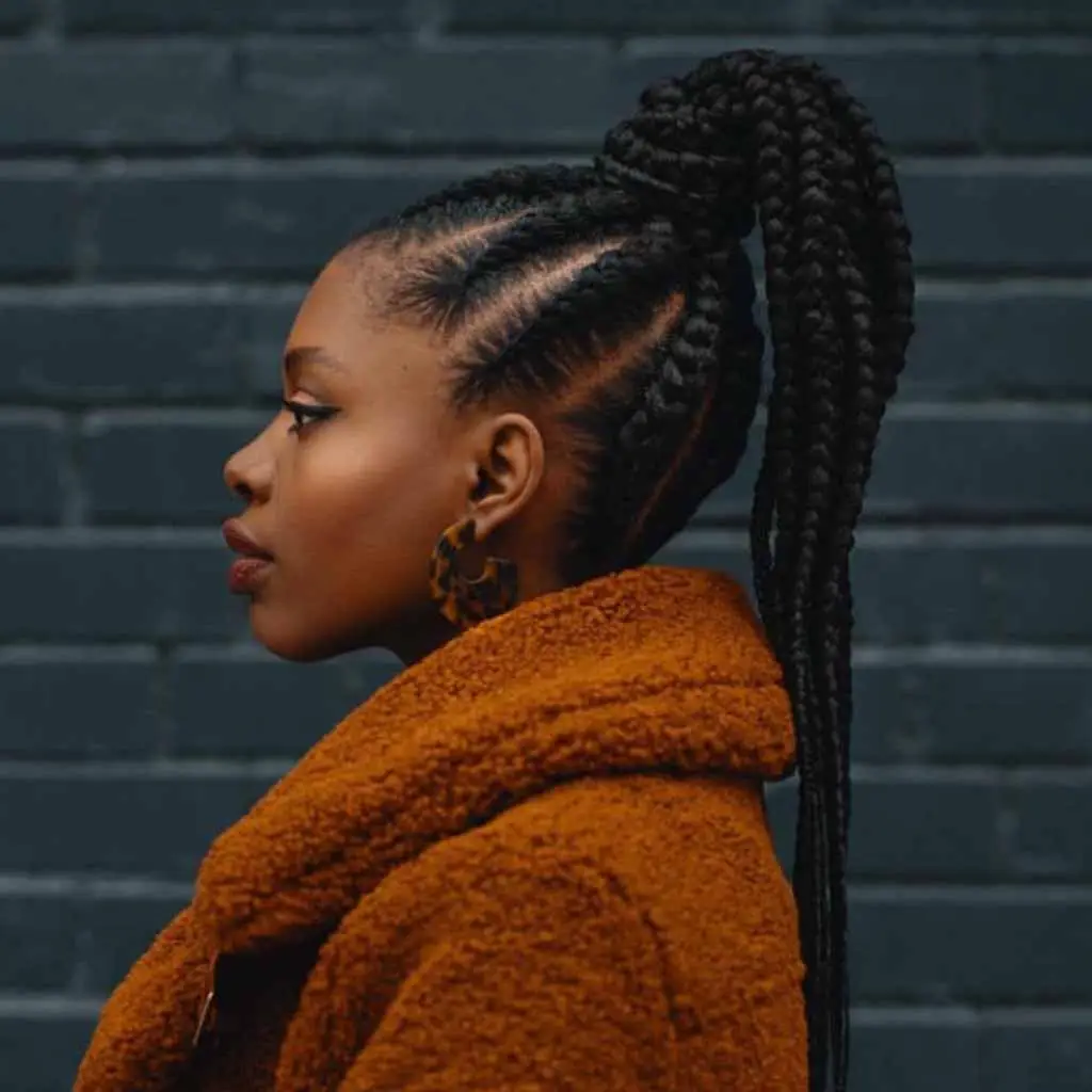 Crown-like goddess braids with free-flowing ends