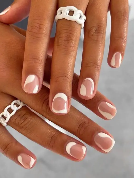 Beige acrylic nails with subtle micro French tips