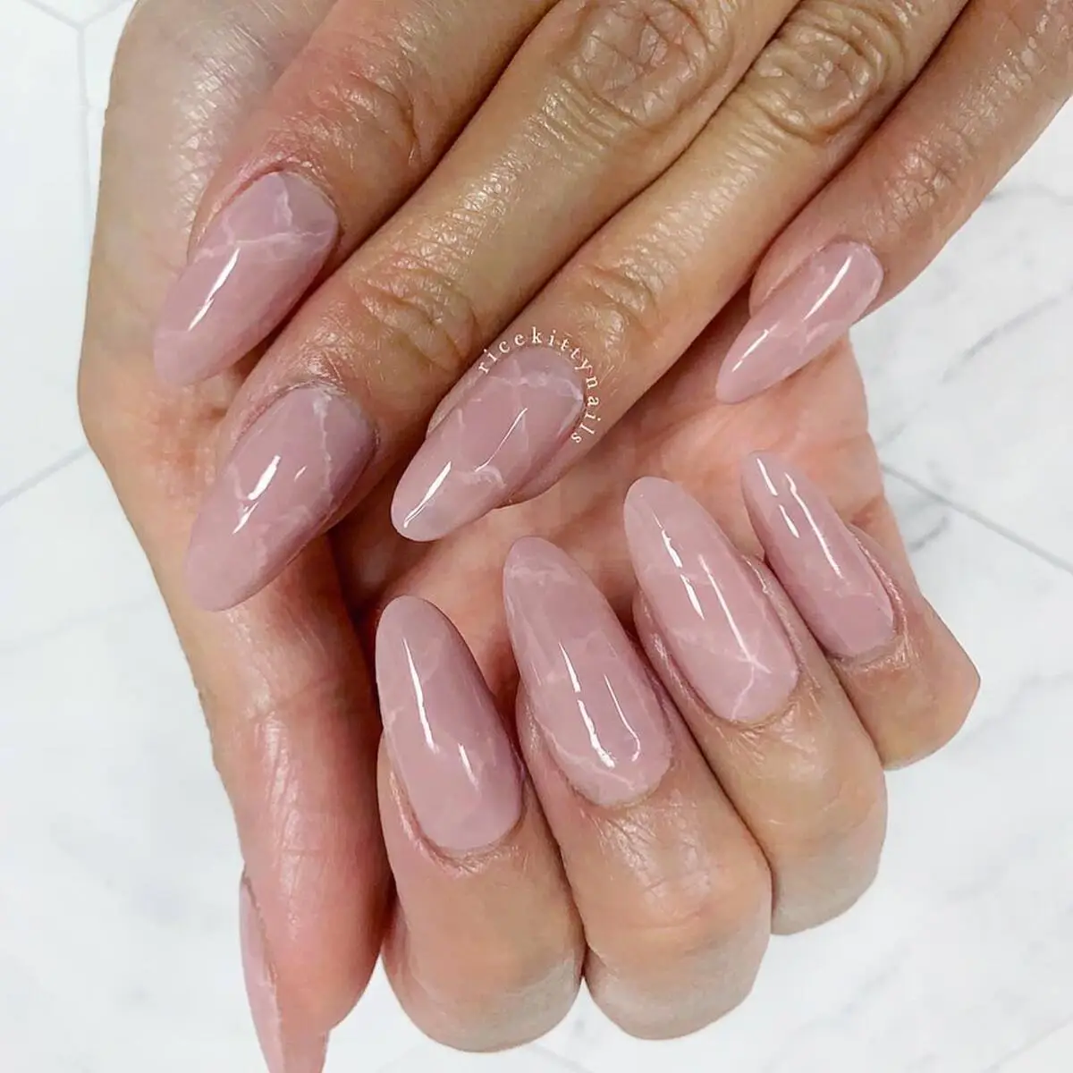 Elegant Neutral Spring Nails with Gold Accents